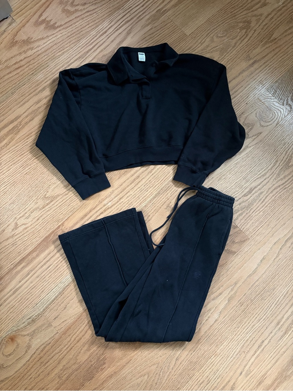 Victoria’s Secret black sweatpants and polo sweatshirt top